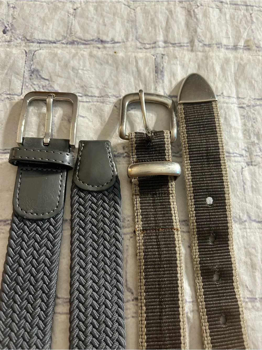 LOT OF (2) MEN NEUTRAL COLOR BELTS GREY STRETCH & TAUPE/TAN FABRIC SILVER TONE